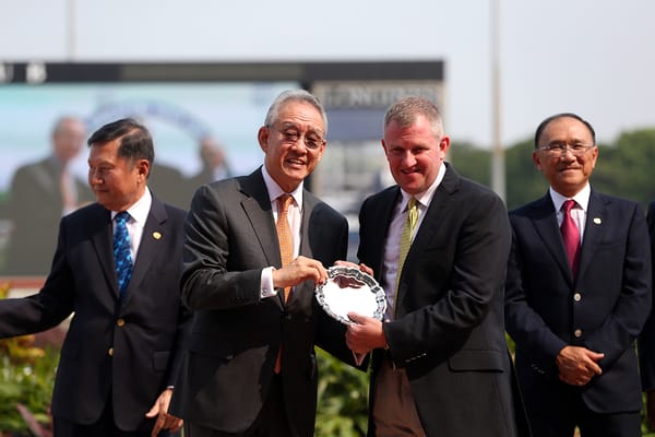 Walker seals fourth Singapore title
